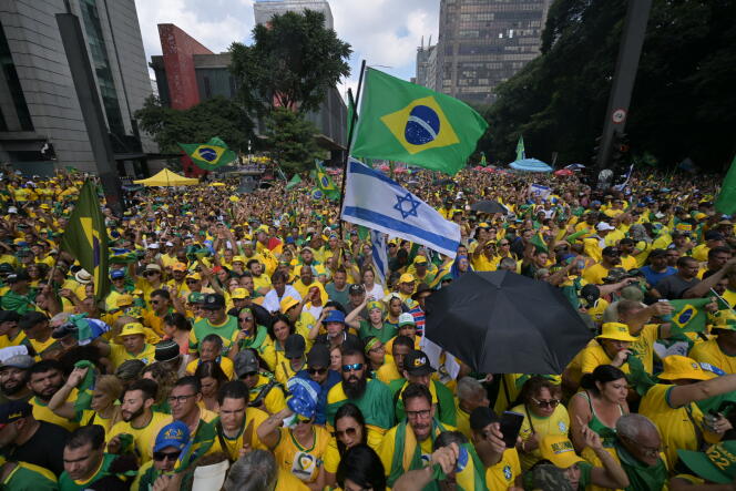 Supporters of former Brazilian President Jair Bolsonaro attend a rally in Sao Paulo, Brazil, February 25, 2024.