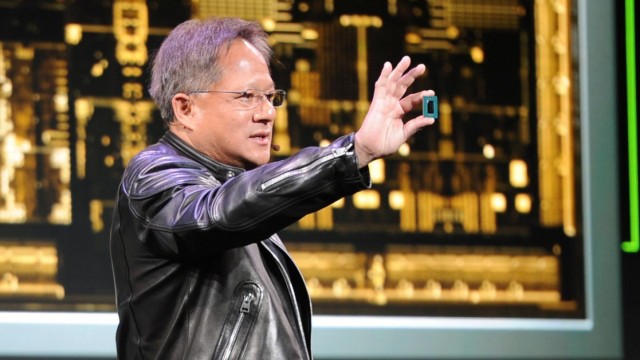 AI chip market: Jensen Huang, head of the chip specialist Nvidia, at an appearance at the CES technology trade fair with the prototype of a chip.