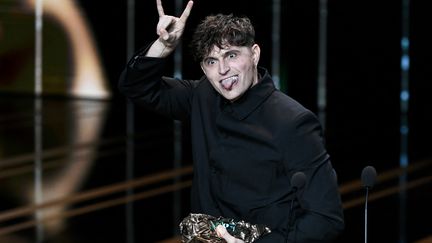 French actor Raphaël Quenard wins Best Male Revelation Prize for the film "Dog of the breakage" during the 49th edition of the César du cinéma ceremony at the Olympia in Paris on February 23, 2024. (STEPHANE DE SAKUTIN / AFP)