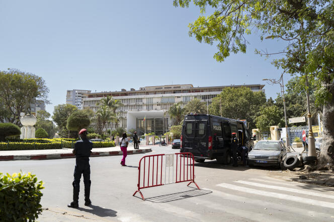 Police stand guard in front of the Senegalese National Assembly, in Dakar, February 5, 2024.
