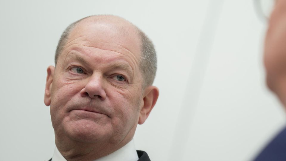 Chancellor Olaf Scholz at a press conference