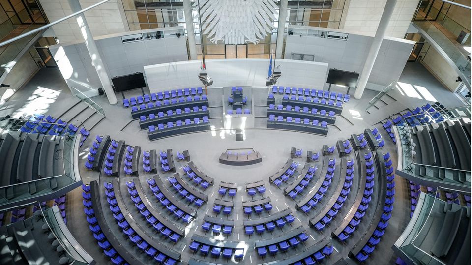 empty chairs in the plenary hall of the Bundestag