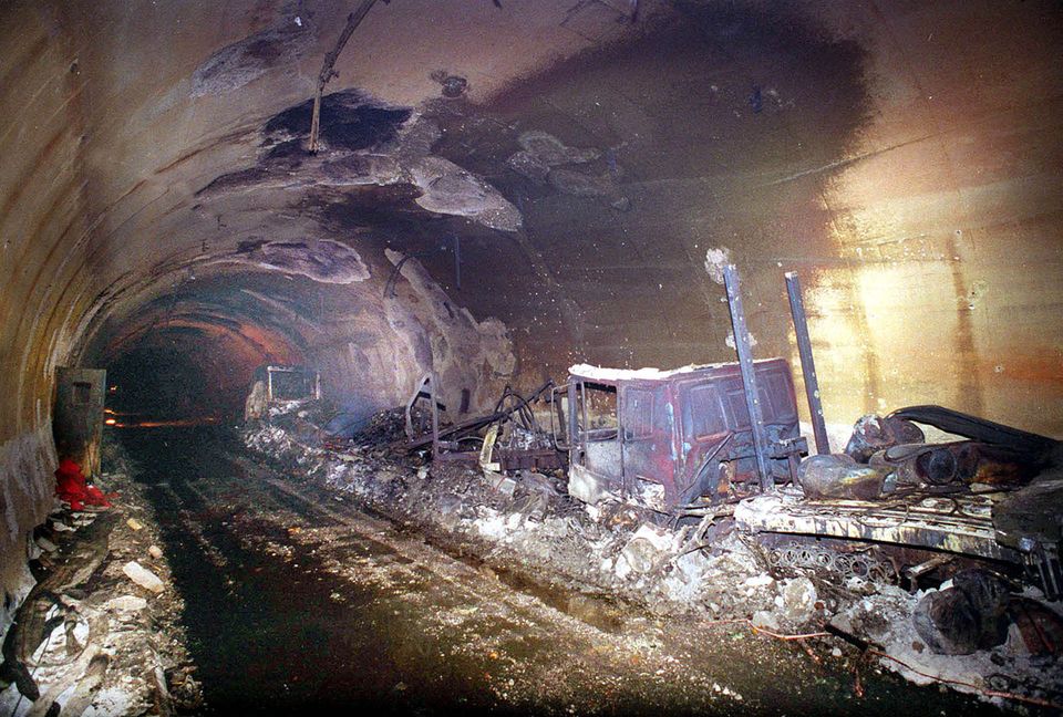 Burnt-out vehicle wreckage stands in the Mont Blanc tunnel after the fire