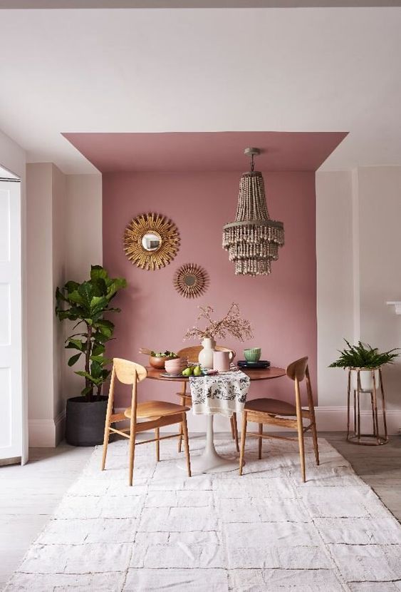 A canopy effect with painting to highlight the dining area