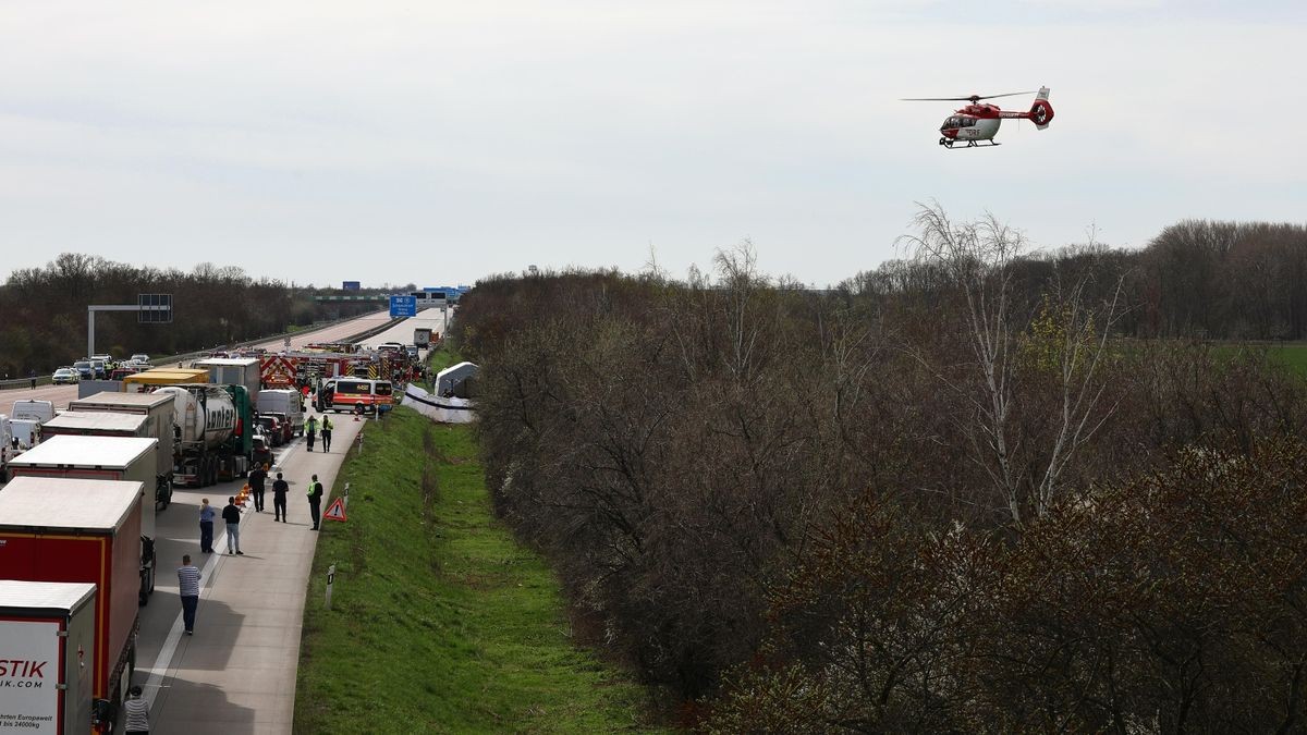 A German Air Rescue (DRF) rescue helicopter is in action over the scene of the accident on the A9.