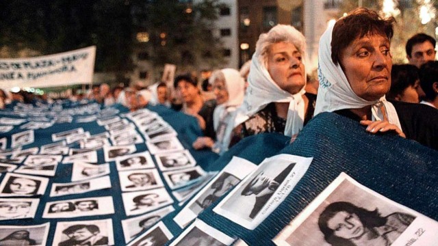 Argentina: Mothers from Plaza de Mayo, here at a meeting on March 24, 2000. Their white headscarves symbolize the fight for human rights.