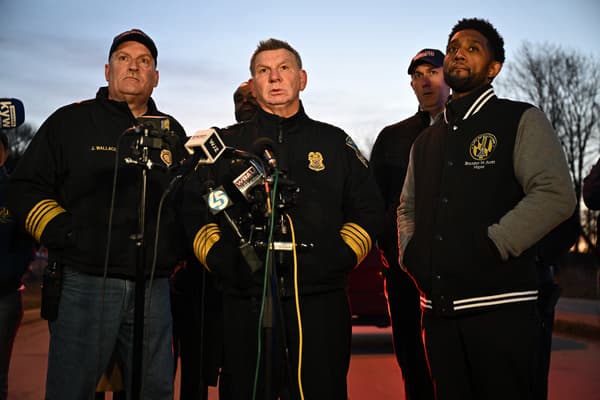 Baltimore Police Commissioner Richard Worley with Mayor Brandon Scott and Fire Chief James Wallace during a press conference on the bridge collapse in Baltimore, Maryland on March 26, 2024.